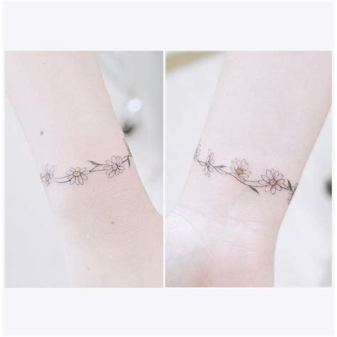 daisy chain tattoo|daisy wrist tattoos for women.